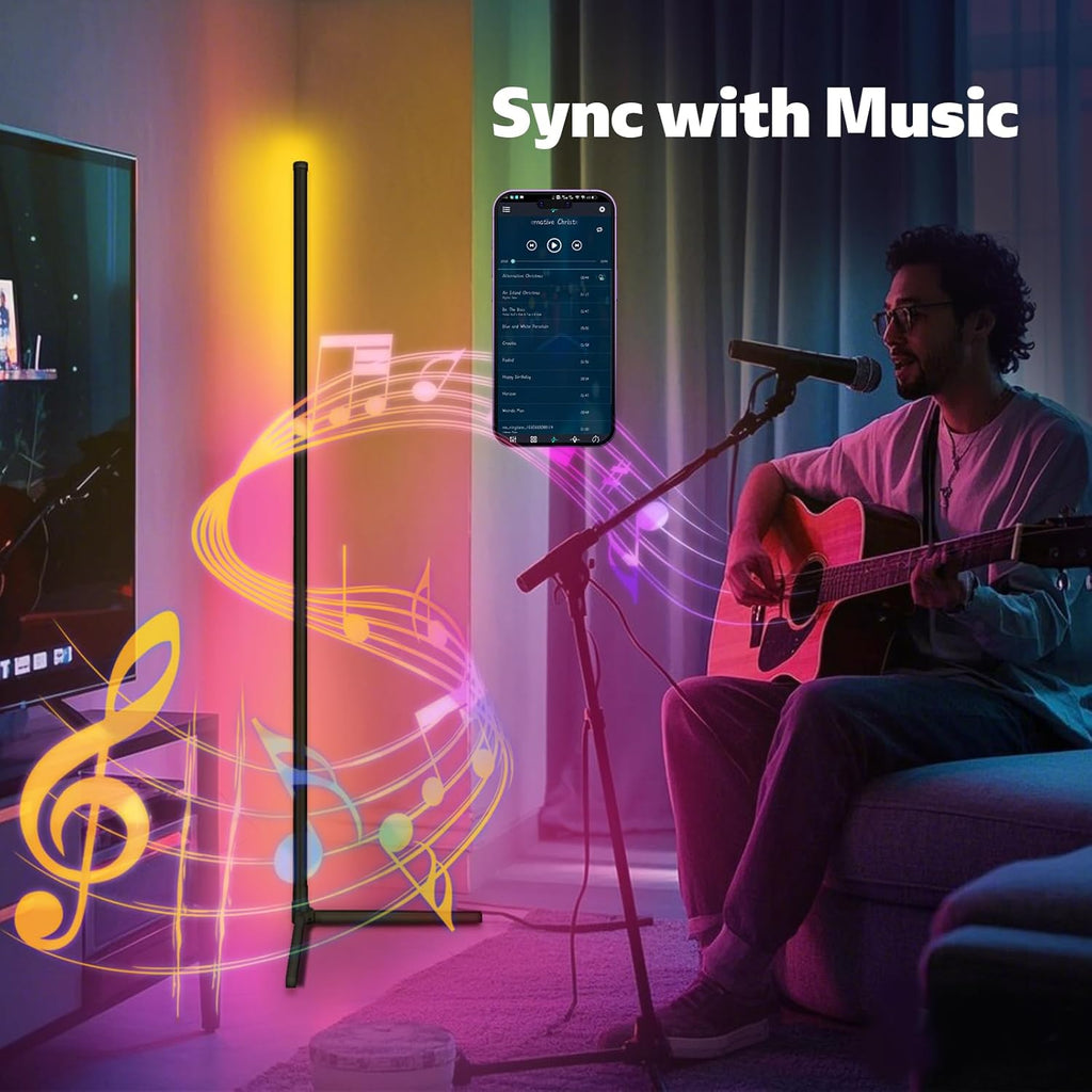 LED corner floor lamp syncing colors to live music with built-in microphone feature, yellow and pink ambient glow in a music room setup