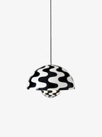 Nordic bud pendant light hanging over kitchen island